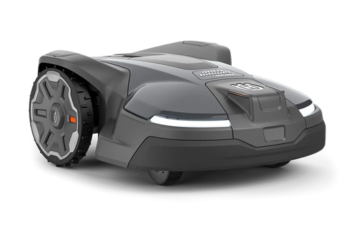 Front / Side image of Husqvarna Automower 450XNERA with LED lights on.