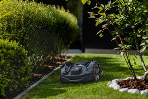 Husqvarna Automower - Robot Lawn Mower installed in a small garden.  